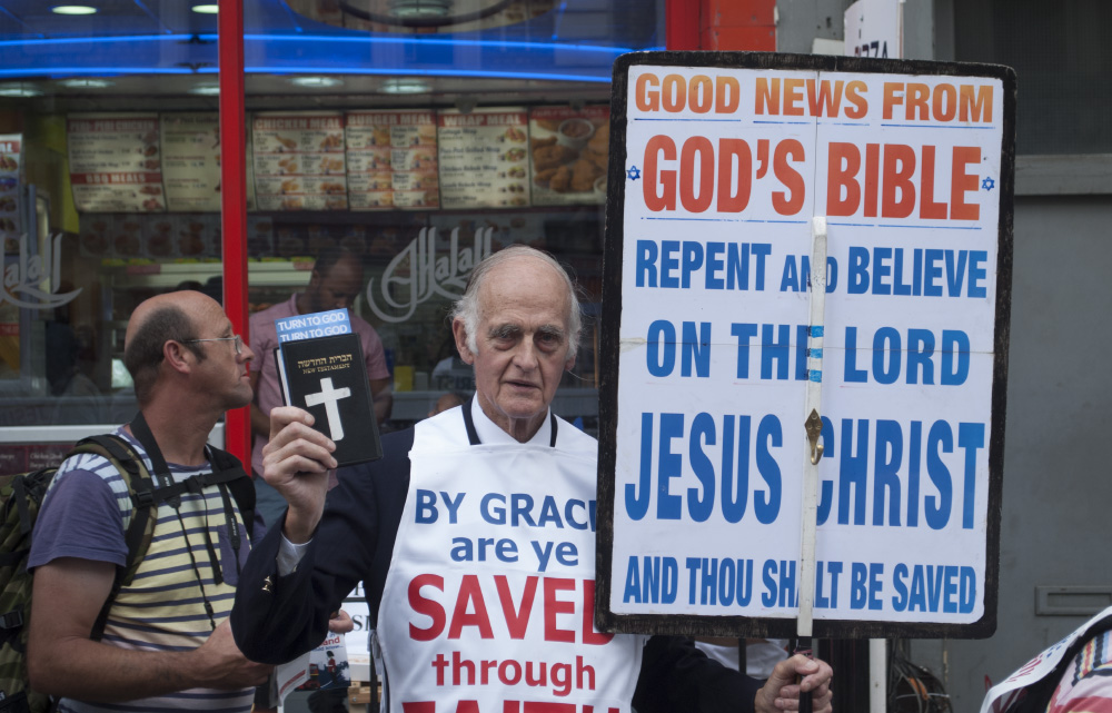 set fire to the preacher who is promising us hell